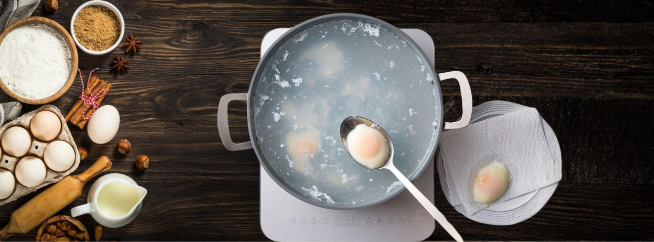 An egg poaching in gently simmering water