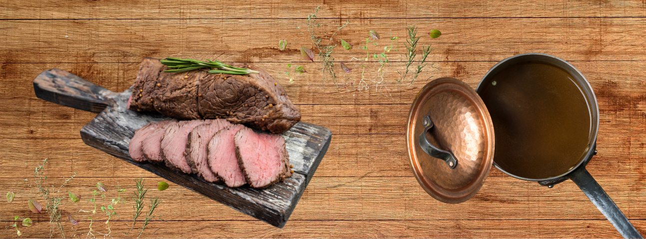 Sliced meat on a cutting board with visible smoke ring and bar