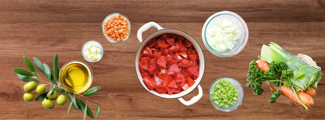 Tomato sauce ingredients — fresh tomatoes, onion, carrots, celery, garlic, and olive oil
